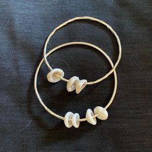 Silver bangles with Hawaiian shells